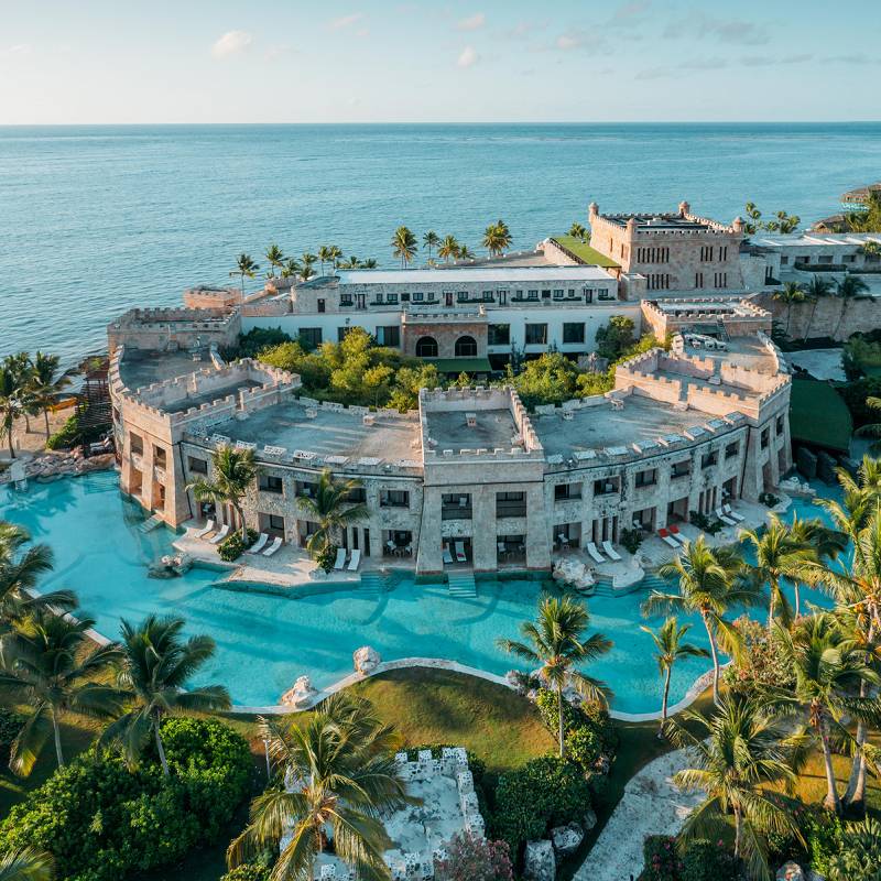 A resort with a pool and water slide.