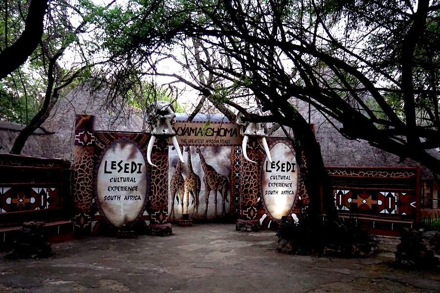 A safari themed entrance to the lesedi cultural village.