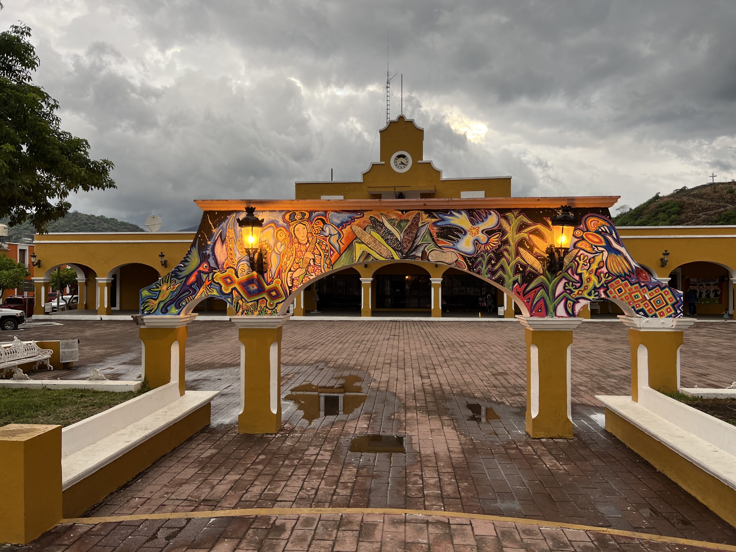 A building with a mural on the side of it.