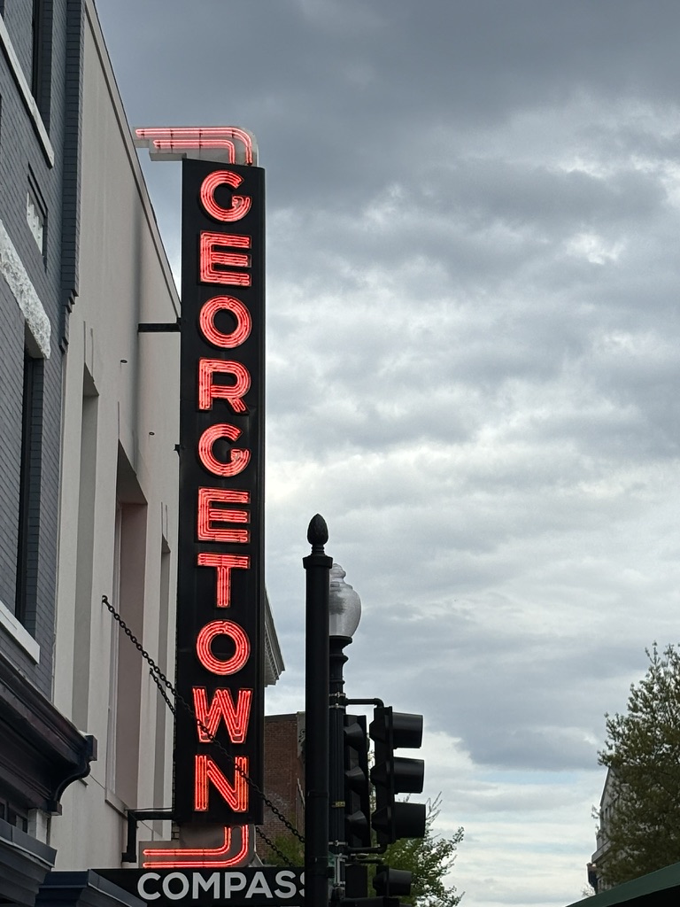 A sign that says georgetown on the side of a building.