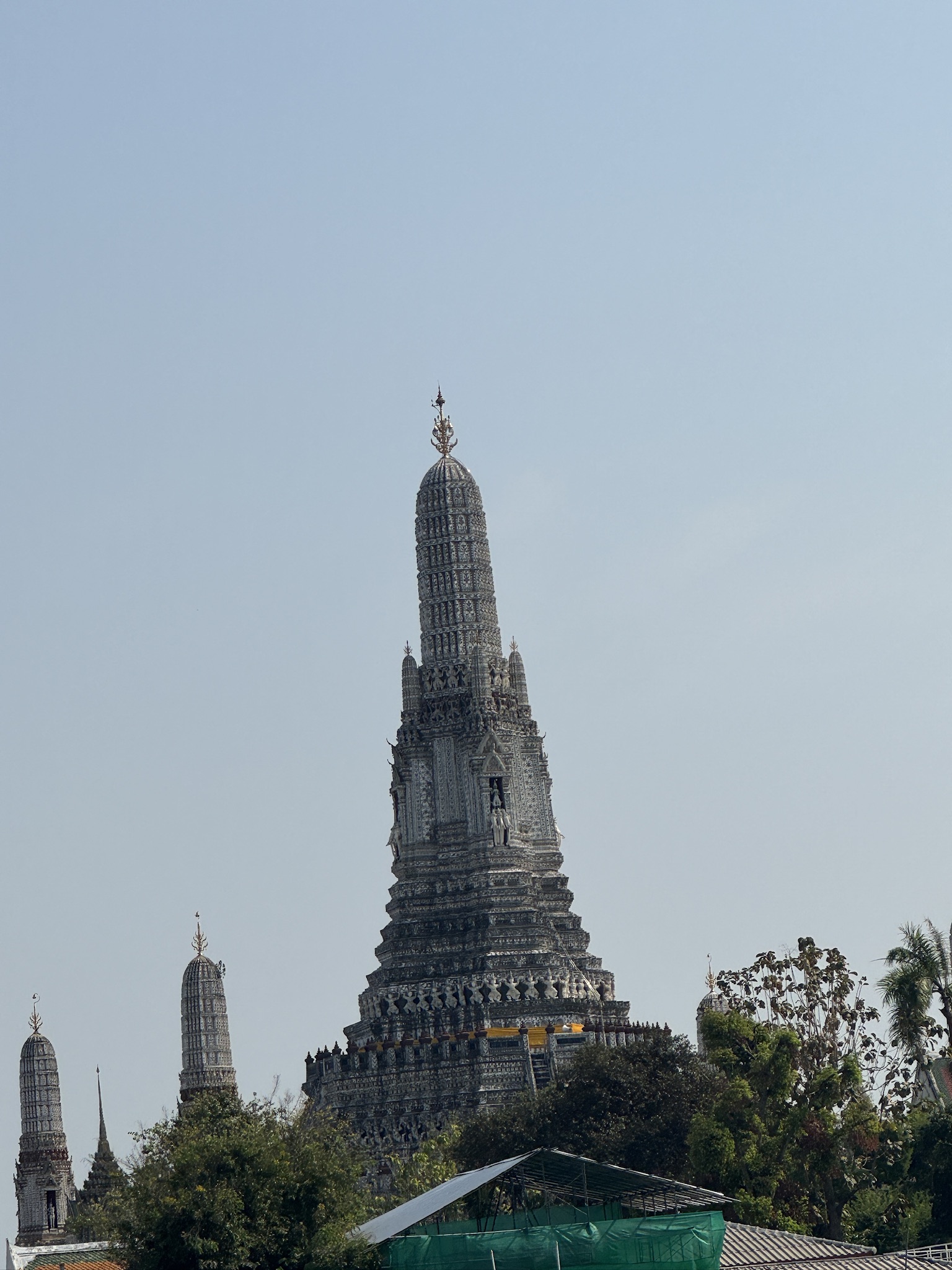 A very tall tower with a spire on top of it.