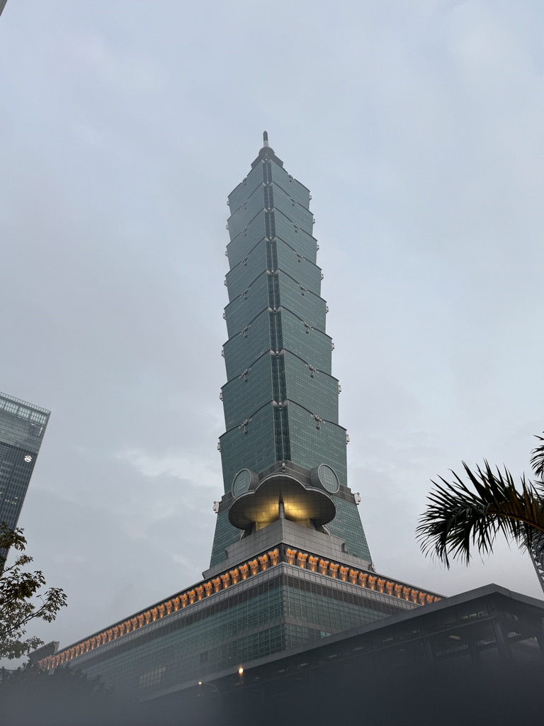 A tall building with a large sky background